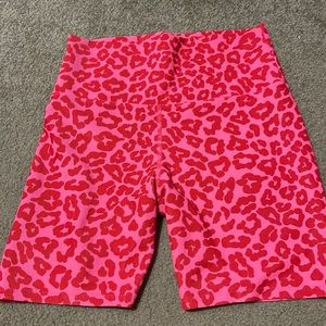 beach riot x revolve bike short in famous high risk red leopard SIZE L